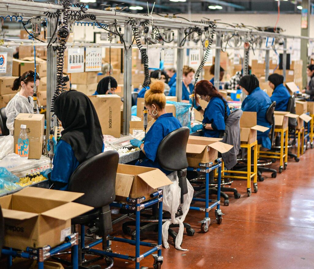 Women working on SodaSteam devices at the SodaStream factory in Israel in 2019.